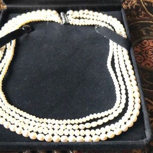 Novera Four strand  Peosta pearl necklace